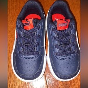 Red, white and blue pumas